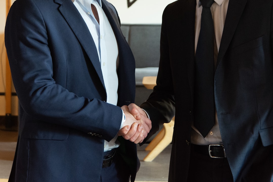 Reliable electrician establishing professional business relationship with client